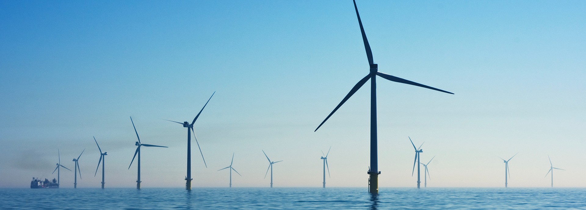 offshore wind turbines in open water vista