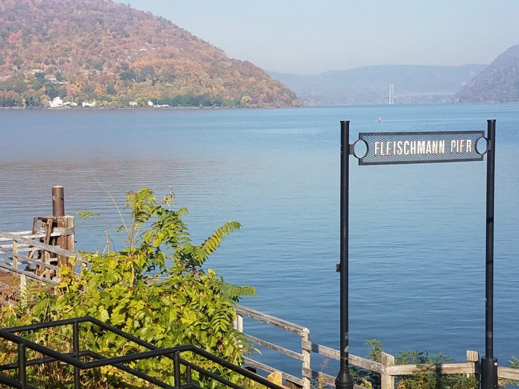 View of pier sign overlooking hudson river in peekskill ny