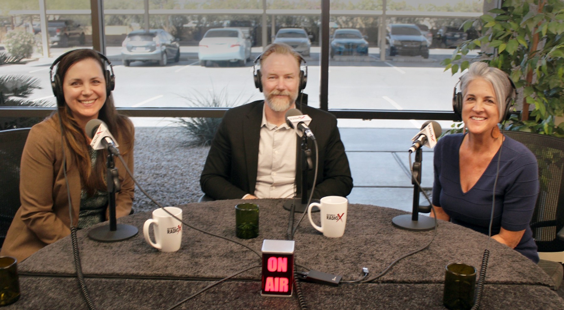 Elizabeth Mora, Nathan Miller and Karen Nowicki posing at interview at Phoenix Business Radio X