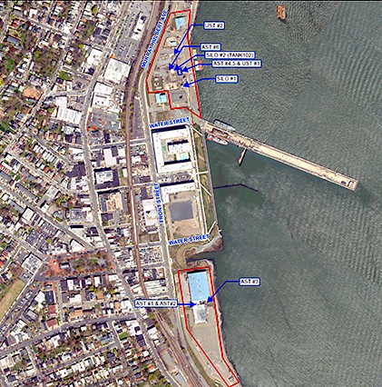 aerial map of project site with water and pier on right and land and buildings on left