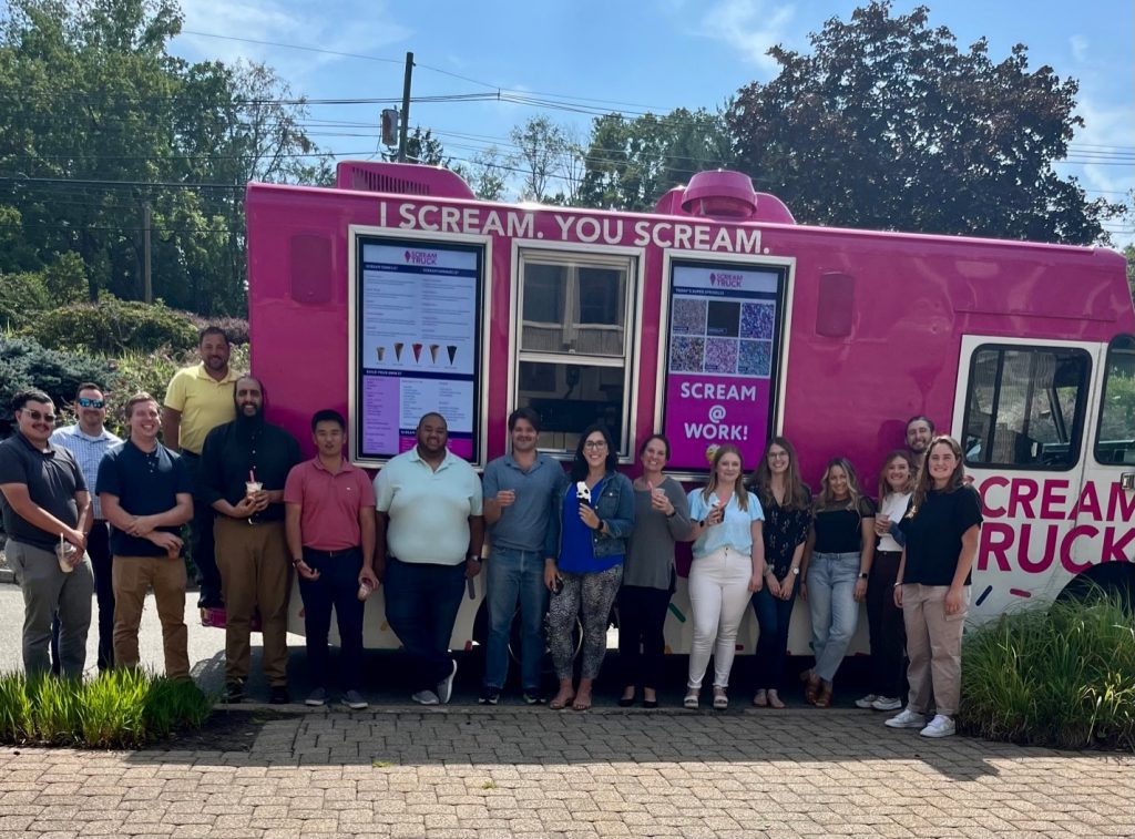 group shot of staff in front of ice cream truck